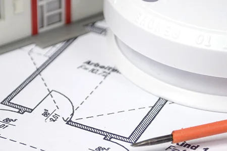 Rauchmelder auf Bauplan